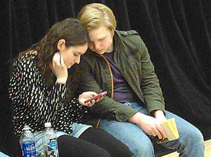 Catherine Callahan and Alex Sebastian Stone take a break during a rehearsal. Photo courtesy of McLean Community Players.