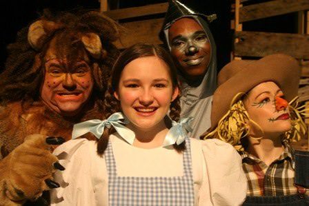 Dorothy (Clare Peyton), Scarecrow (Kelsey Painter), Tin Man (Derek Cooper), and Lion (B. Thomas Rinaldi). Photo courtesy of Pumpkin Theatre. 