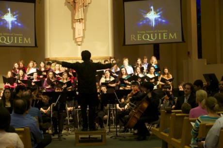 Kristofer Sanz conducts at 'Requiem' at Young Artists of America. Photo by Carmelita Watkinson.