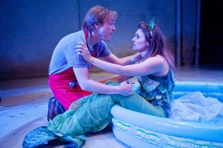 Dale (Chris Aldrich) rescues Shelly, the mermaid (Amie Cazel) from the kiddie pool. Photo by C. Stanley Photography.