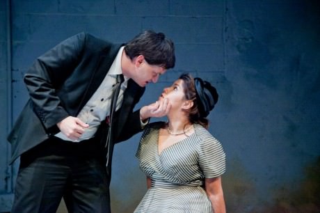 The Frenchman (Brandon Mitchell) seducing Siobhan (Monalisa Arias) on the train. Photo by C. Stanley Photography.