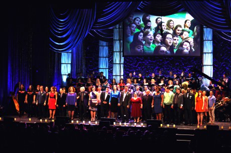 Finale - Cast and Sandy Hook Elementary School students (on video screen). Photo by Grace Rainer Long.