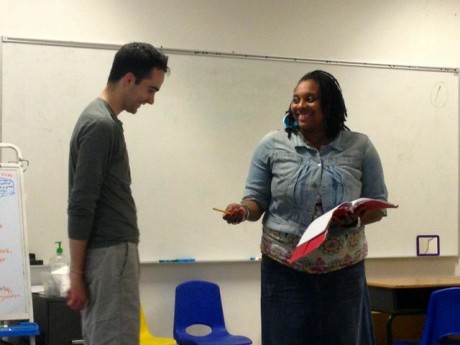 Actors Forest Rilling (left) and Sharyce L. McElvane work an amusing moment in the script.
