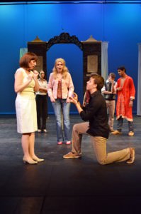  Elle Woods (Melina Smith) finds the love of her life, Warner (Josh Conrad), proposing to Vivenne (Valerie Chamness). Photo by  Larry McClemons.