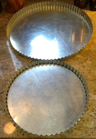 French tart pans, 9 ½ inch and 12 ½ inch diameter.