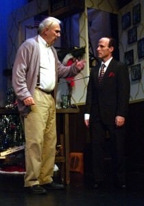 R to L: Pops (Robert Hoke), discusses his use of the company phone with Clifton Feddington (Patrick Mason). Photo by Steve Teller. 