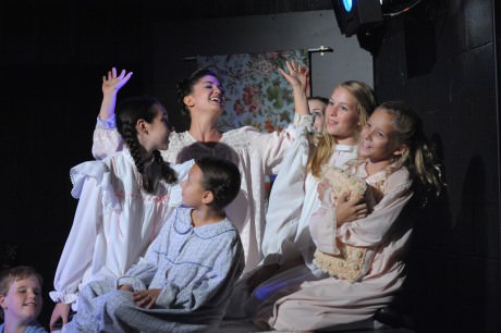 Katie Keyser as Maria with the von Trapp Children. Photo by Stan Barouh.