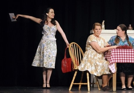 (From left) Terra Vigil, (Sybil), Kathryn Huston (Aunt Ola,) Caity Brown  (Tood), and Rinn Delaney (Weetsie) rehearse a scene from “The Cover of Life”.photo by Greg Dohler/The Gazette.