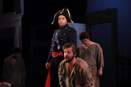Javert (L- Renwick Anson Paige II) and Jean Valjean (JP Sisneros). Photo courtesy of Montgomery College Summer Dinner Theatre. 