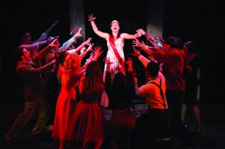 Emily Zickler as Carrie White and the ensemble of Studio 2ndStage's Carrie: The Musical. Photo: Igor Dmitry.