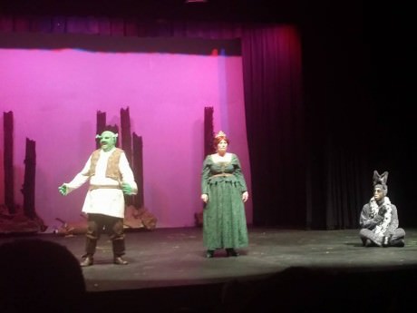 Glynn Cosker (Shrek), Jennifer LePaige (Fiona), and Devyn Tinker (Donkey). 