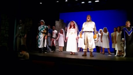 Stacy Crickmer (left as Lady of the Lake) and Jim Mitchell (right as King Arthur) and cast of Zemfira Stage's 'Monty Python's Spamalot.' Photo by Zina Bleck.