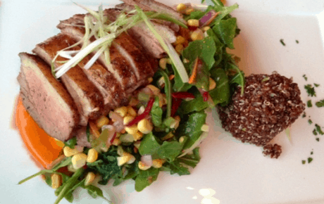 Hudson Valley Duck Breast with Quinoa and Spicy Corn Salad at Maple Avenue.