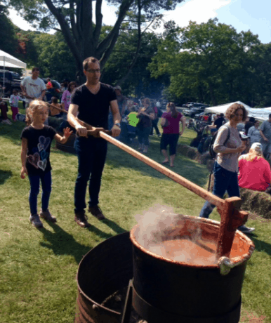 Stirring the apple butter.