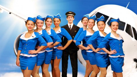 Frank Abagnale Jr. (Lucas Weals) and his stewardesses. Photo courtesy of Walt Whitman High School.