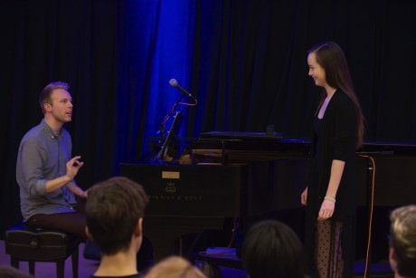 Gillian Jackson Hahm singing and receiving advice from Pasek and . Photo courtesy of CYM Media & Entertainment.