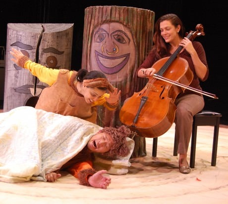 As Winter winds down, Sister Bear wakes up Brother Bear from hibernation. Accompanying  their journey through the seasons is live cellist, Katie Chambers. (L to R Nora Achrati, Jacob Yeh, and Katie  Chambers). Photo by Laura DiCurcio.