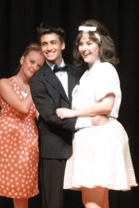  Isaac Solomon playing Link (center), Kaisa Nichols-Russell playing Tracy (right) and Magdalena Kowalska (left) playing Tammy in 'Hairspray.' Photo by  Diane Russell. 