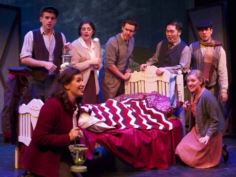  The villagers discover that someone is asleep in the mysterious stranger’s bed. Left to right, Foreground: Christine Browne-Munz, Mandi Harper; Background: Andrew Pendola, Melissa Chavez, Andrew Sauvageau, Jason Lee, and Eduardo Castro. Photo by Angelisa Gillyard.