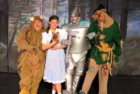Amy Hebb (Cowardly Lion), Kelsey Swann (Dorothy), Adam Blackstock (Tin Man), and Tim Henderson (Scarecrow). Photo courtesy Other Voices Theatre.