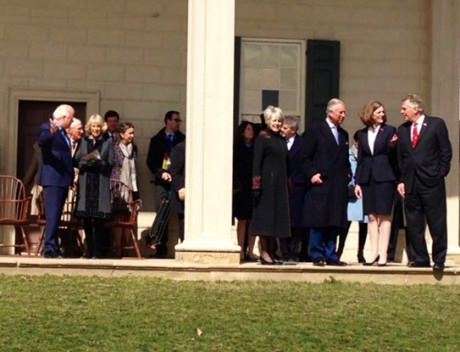 The Prince of Wales talks with Governor McAuliffe (at far right) and Carol Cardou (left of the Governor) – Camilla is seen on the left of the column with Mount Vernon’s President Curt Viebranz.