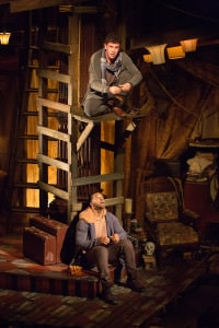 “This is not the first time we’ve spun coins.” Adam Wesley Brown (Guildenstern, top) and Romell Witherspoon (Rosencrantz) star in Rosencrantz and Guildenstern Are Dead. Photo by Jeff Malet.