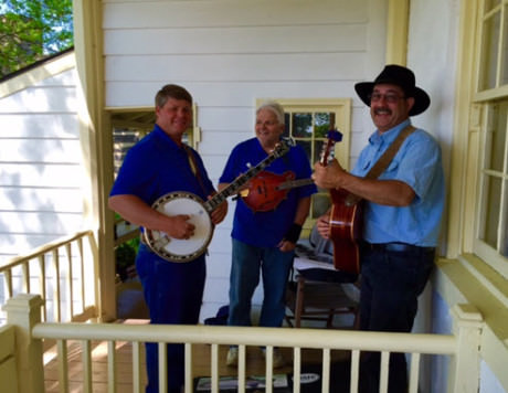 The Cobbler Mountain Grass band tunes up on the porch of Mt. Bleak House.