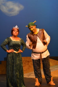 Fiona (Carla Astudillo) is not happy that Shrek (Jason Krage) thinks her childhood was "easy". Photo by Rosemarie O'Connor.  