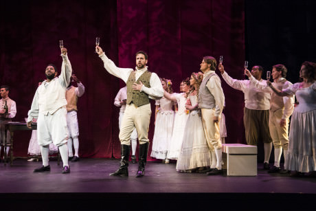 Daren Jackson, Anthony Eversole Don Giovanni toasts to the group at a party. Photo by Teresa Castracane.