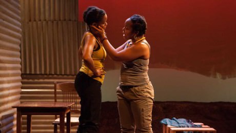 Aimé Donna Kelly (left) and Lynnette R. Freeman in InterAct Theatre Company's 'The Dangerous House of Pretty Mbane. Photo by Kate Raines/Plate3Photography.