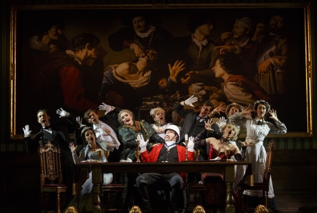 The cast with John Rapson (Lord Adalbert D’Ysquith (in red). Photo by Joan Marcus.