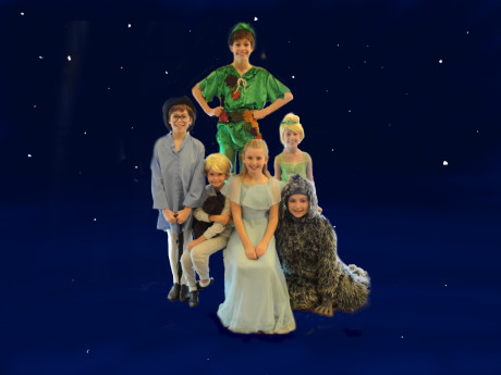 From left to right: John Darling (Eli Langer), Michael Darling (Izzy Alexander) Peter Pan (Zoe Alexander), Wendy Darling (Madison Sherman), Tinker Bell (Alexa Vinner), and Nana (Josie Stein). Photo by photo by Laurie Levy Issembert.