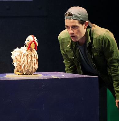 Chris Dinolfo and the golden chicken. Photo: by Margot Schulman. 