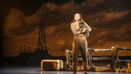 Sarah Lasko as Dorothy and Nigel as Toto in “Over The Rainbow” in 'The Wizard of Oz.' © Daniel A. Swalec. 