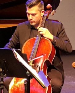 Cellist, Sean Neidlinger. Photo by Robert Jansen.