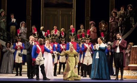 Tenor Lawrence Brownlee escorts Justice Ruth Bader Ginsburg at the curtain call. Photo by Scott Suchman.