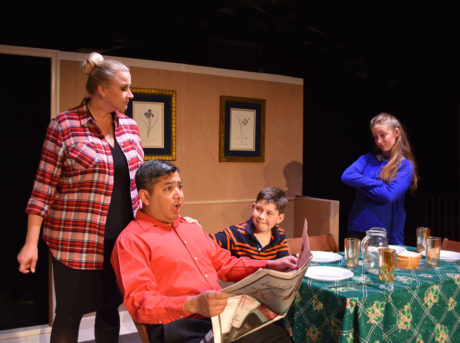 Far Right: Evelyn Izdepski (Beth) listens on as the Bradley family discuss the annual Christmas Pageant in The Best Christmas Pageant Ever (L to R) Michelle Shader, Daniel Calderon and Samuel Pounds. Photo by Chip Gertzog, Providence Players