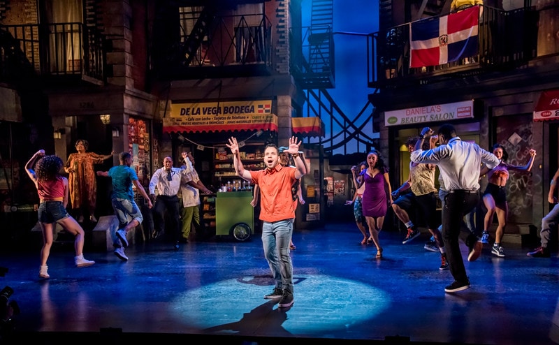 Robin de Jesús and the ensemble of In the Heights, co-produced by Olney Theatre Center and Round House Theatre. Photo by Stan Barouh.