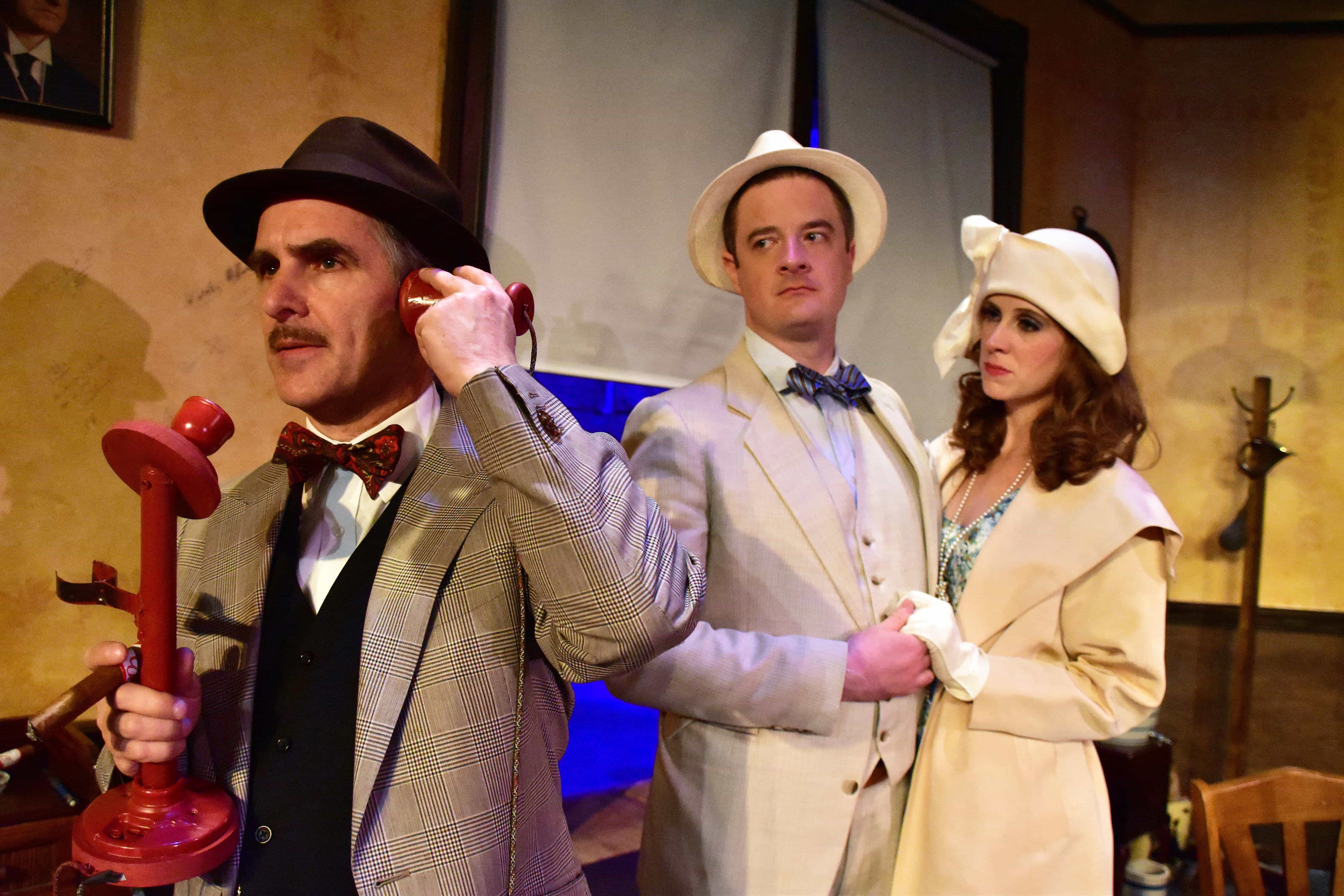 L to R: David Whitehead as Walter Burns, Jaclyn Robertson as Peggy Grant and Chuck O’Toole as Hildy Johnson in the Providence Players production of The Front Page at the James Lee Community Center Theater. Photo by Chip Gertzog.