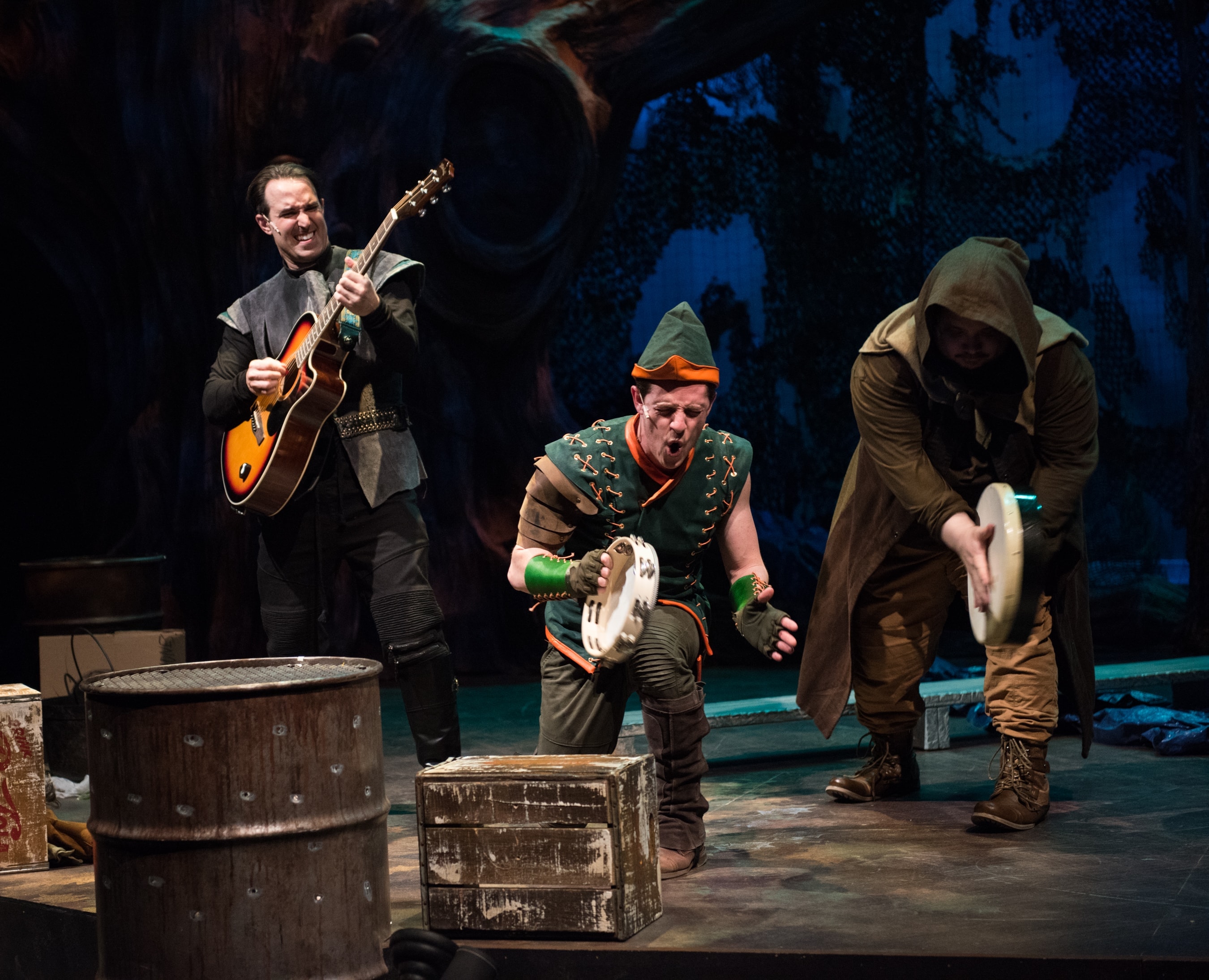 Robin Hood rocks out with his Merry Men. [L-R: Nick DePinto, Christopher Dinolfo, Jon Jon Johnson]. Photo by Margot Schulman.