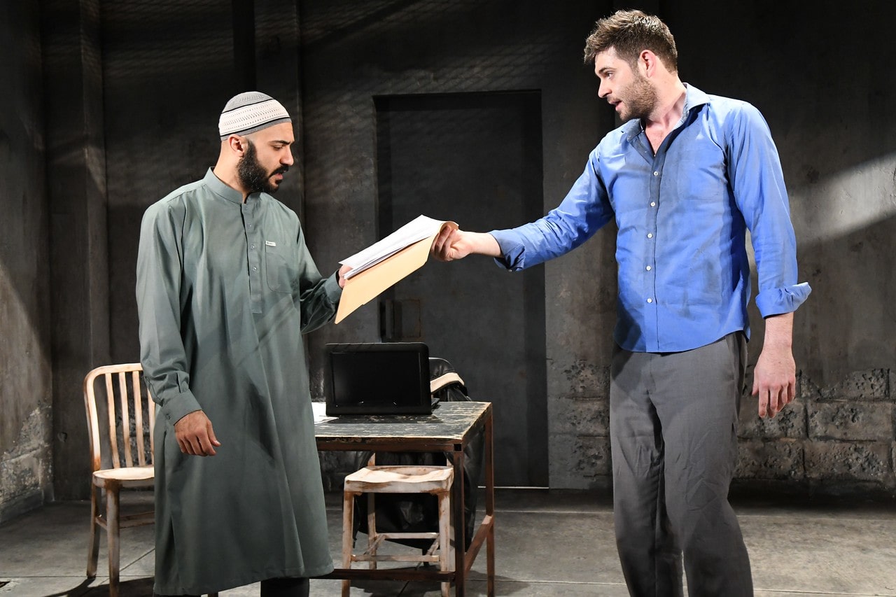 Maboud Ebrahimzadeh and Thomas Keegan as Bashir and Nick Bright in THE INVISIBLE HAND at Olney Theatre Center. (Photo: Stan Barouh)