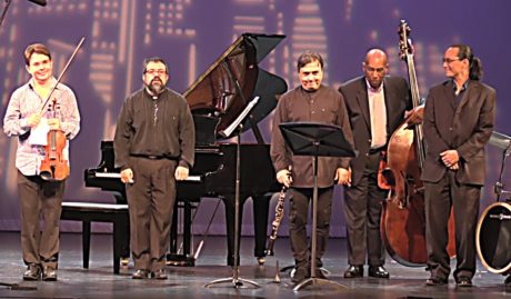 The National Chamber Ensemble takes a bow at the end of its performance, Today's Classical and Jazz Masters. Photo by Robert Jansen.