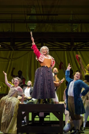Soprano Emily Pogorelc (Cunegonde), mezzo-soprano Denyce Graves (The Old Lady) and tenor Alek Shrader (Candide) in the Washington National Opera's production of Candide. Photo by Scott Suchman.