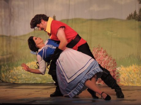 Jaimie Lea Kiska as Belle and David C. Jennings as Gaston in Disney's Beauty and the Beast, now playing at Way Off Broadway Dinner Theatre.