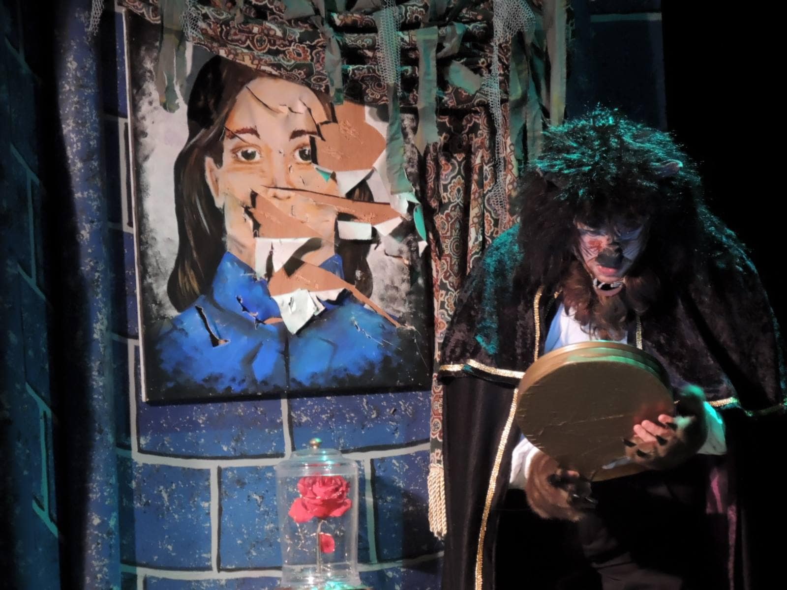 Noah Israel as the Beast in Disney's Beauty and the Beast, now playing at Way Off Broadway Dinner Theatre.