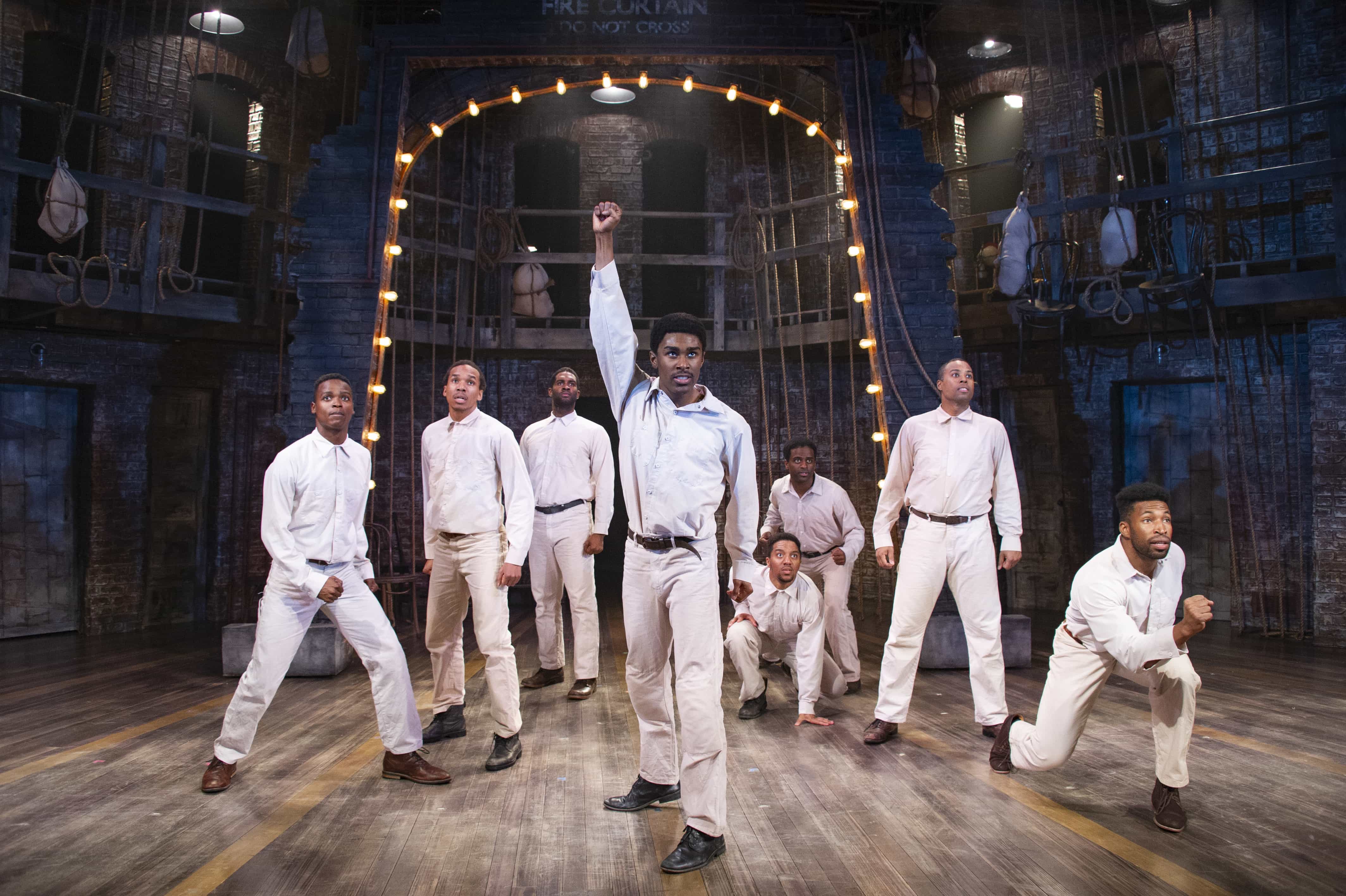 Aramie Payton (Eugene Williams), Joseph Monroe Webb (Olen Montgomery), Darrell Purcell Jr (Clarence Norris), Lamont Walker II (Haywood Patterson), Malik Akil (Charles Weems), C.K. Edwards (Roy Wright), DeWitt Fleming, Jr. (Ozie Powell), and Jonathan Adriel (Andy Wright) in The Scottsboro Boys at Signature Theatre. Photo by C Stanley Photography.