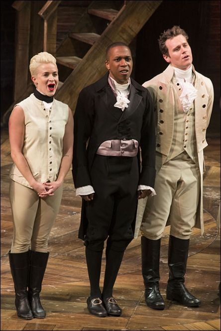 Betsy Struxness onstage in Hamilton with Leslie Odom, Jr. and Jonathan Groff.