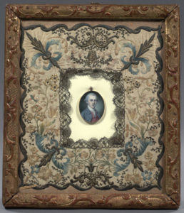 Picture frame embroidered by Eliza Schuyler Hamilton. Painting of Alexander Hamilton by Charles Willson Peale.