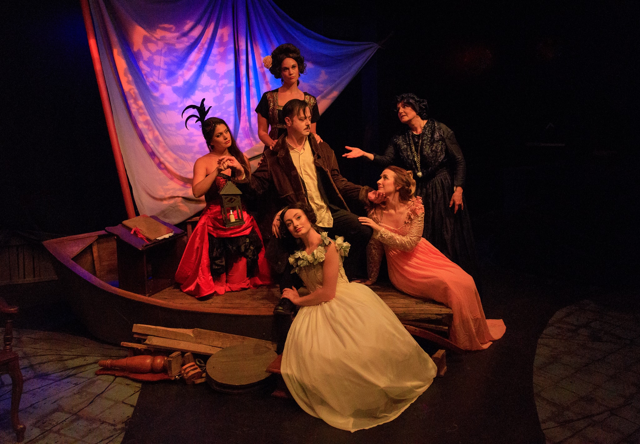 Clockwise from Center: Katherine Riddle as Mother, Jennifer Pagnard as Muddy, Erin Granfield as Elmira, Sara Hurley as Virginia, Stephen Gregory Smith as Edgar Allan Poe, and Mary Kate Brouillet as the Whore in Nevermore. Photo Credit: Keith Waters/Kx Photography