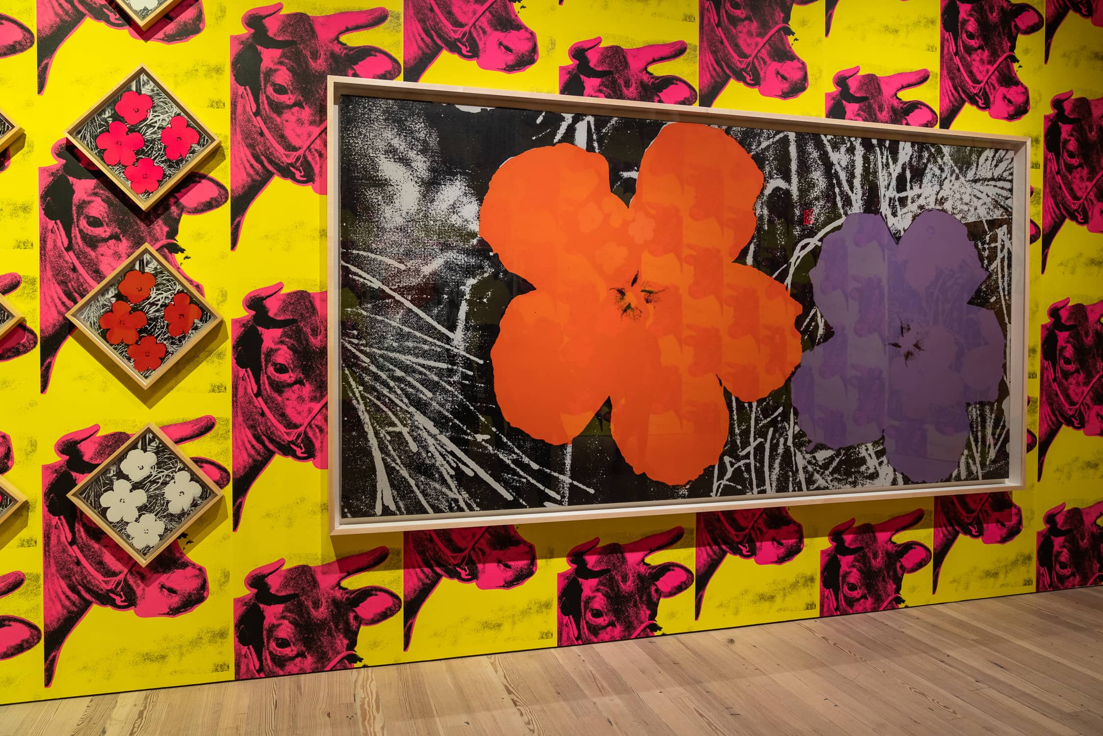 Andy Warhol, Cow Wallpaper and Flowers, installation at the Whitney Museum of American Art. © The Andy Warhol Foundation for the Visual Arts, Inc./Artists Rights Society (ARS). Photo by @AbbyWarhola.